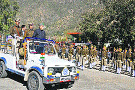 Virbhadra Singh inspects the parade during the Statehood Day function at Sunni in Shimla district on Friday.