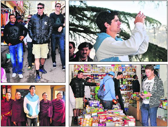 Samit Patel and Kevin Pietersen roam the streets of Mcleodganj on Friday; captain Alastair Cook takes a photograph; a few England players by the essentials; and Cook poses with smiling monks.