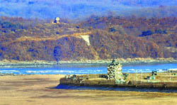 A North Korean guard post (L) and a South Korean guard post as seen from a South Korean observation post in Paju near the demilitarized zone dividing the two Koreas.  AFP