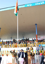 Deputy Chief Minister Sukhbir Singh Badal salutes the national flag at the Republic Day function in Bathinda on Saturday. The function, held at the sports stadium, was a colourful event tinged with patriotic fervour. 