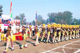 Personnel of the Central Industrial Security Force take part in a march past during the Republic Day celebrations at the BHEL stadium in Haridwar on Saturday