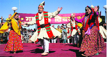 Artistes perform a folk dance during the state-level Republic Day function in Shimla on Saturday