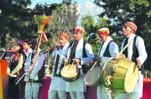 Artistes play folk music instruments during the Republic Day function at the NIFT in Kangra on Saturday.