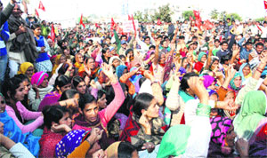 Dismissed Maruti employees organise a rally in Rohtak on Sunday, seeking reinstatement and a high-level judicial inquiry into the violence in the Manesar plant in July last year. 