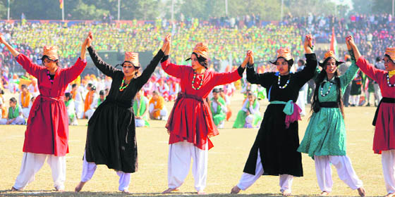 Students perform during the Republic Day function at MA Stadium in Jammu on Saturday.