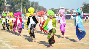 Boys perform bhangra as part of the Republic Day celebrations in Ludhiana. 