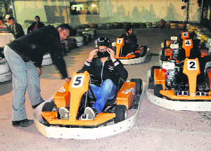 People take part in a go-carting event organised at F2 Raceway, South City, in Ludhiana on Sunday. 
