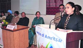 Dr Kirat Sandhu, Director, Spring Dales School, delivers a speech during an interactive session in Amritsar on Sunday
