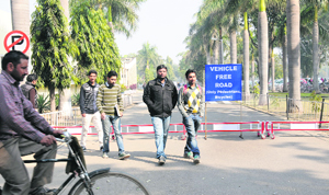 Students walk on a designated vehicle-free road, meant only for pedestrians and cyclists, at the PEC University of Technology in Sector 12, Chandigarh, on Monday. 