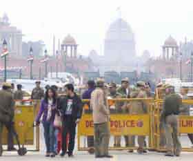 Security personnel keeping a vigil ahead of the Beating Retreat ceremony near Vijay Chowk in New Delhi on Monday.