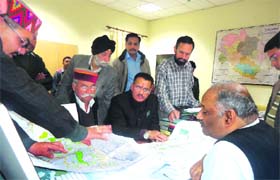 Mussoorie MLA Ganesh Joshi presents the eco-sensitive zone case to the Principal Secretary in Dehradun on Monday.
