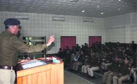 DGP Satyavrat Bansal addresses police officials during a workshop in Dehradun on Monday.