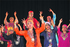 Artistes present a cultural item during the 45th Peace Conference at General Zorawar Singh Auditorium in Jammu on Monday.