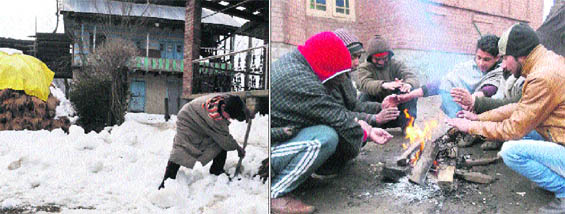 (Left) A youth clears snow from a lawn at Machipora, Handwara; (right) People warm themselves by a bonfire on a cold day in Srinagar on Monday.