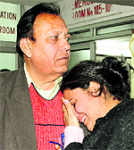 randfather and mother of Moniti Kapoor, who died due to cardiac arrest during school hours, grieve at GMSH, Sector 16, Chandigarh, on Tuesday