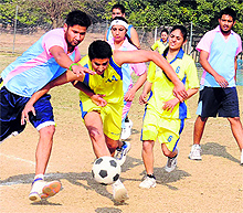 Players vie for the ball during the Korfball Inter-College Tournament at Panjab University in Chandigarh on Tuesday