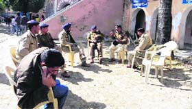 Police officials camp in DAV (PG) College in Dehradun on Tuesday.