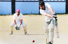A batsman in action during a match in the 61st Dehradun District Cricket League in Dehradun on Tuesday.