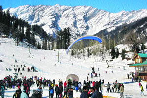 Tourists enjoy themselves at the Solang valley.  