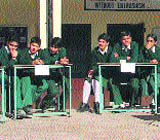 Students participate in a quiz competition at Dhauladhar ND Senior Secondary School, Chalali, Kangra.