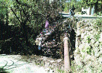 A culvert without a retaining wall has turned into a death trap. Many fatal accidents have taken place at this point.