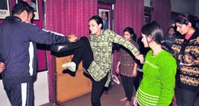KMV students being imparted karate training for self-defence in Jalandhar on Tuesday.