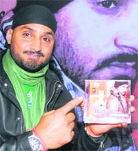 Cricketer Harbhajan Singh releases his video CD Ik suneha on a poetical message against vulgar songs in Jalandhar on Tuesday.