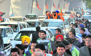 Vehicles caught in a trafffic jam during a BJP rally in Ludhiana on Tuesday.