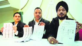 Sandeep Gorsi (centre), an advocate and Congress leader, along with councillor Gurinder Rishi addresses mediapersons in Amritsar on Wednesday