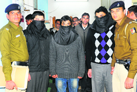 The accused in police custody at the Chandigarh Police Headquarters in Sector 9, Chandigarh, on Wednesday.