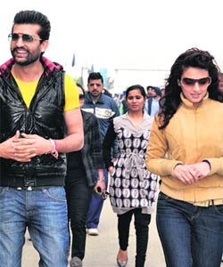 Actor-singer Yuvraj Hans and Punjabi actress Anita during their visit to the CT Group of Institutes for entertainment programme Shugli in Jalandhar on Wednesday.
