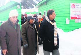 From left: Ministers Nazir Ahmad Khan, Ajay Sadhotra and Mohammad Ramzan during their visit to snow-bound Gurez valley on Wednesday