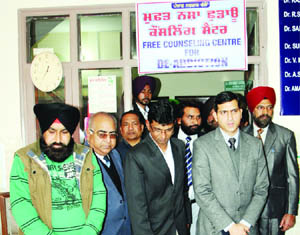 Deputy Commissioner Rajat Aggarwal comes out of the drug de-addiction centre after its innauguration at Maqboolpura in Amritsar on Thursday.  