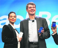 BlackBerry President & CEO Thorsten Heins (R) stands with new BlackBerry Global Creative Director Alicia Keys at the BB10 launch in New York on Wednesday. 