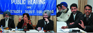 Chairman of the Punjab State Electricity Regulatory Commission Romila Dubey, flanked by the PSERC members, presides over the public hearing held in Bathinda on Thursday. Members of rice millers association (right) at the PSERC public meeting.