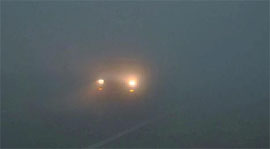 A car makes its way through dense fog on a city road on Thursday morning. After enjoying bright sunshine for more than a fortnight, on Thursday, the residents of Bathinda and its surrounding areas woke up to a morning enveloped in a thick layer of fog. Although the fog cleared by late morning, the sky remained cloudy. The maximum temperature was recorded at 19.8 degree Celsius and minimum temperature was recorded at 8.8 degree Celsius.