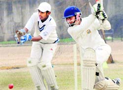 A batsman strikes the ball during a match at DAV School, Sector 8, Chandigarh, on Thursday.