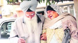 Relatives grieve at the residence of the victims at Sector 32, Chandigarh, on Thursday.