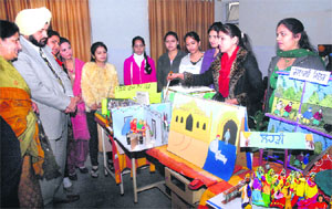 B.Ed students of the Lyallpur Khalsa College of Education for Women demonstrate the working of models during an exhibition
