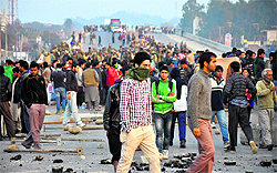 Protesters block Kunjwani-Sidhara highway following an anti-encroachment drive launched by the JDA