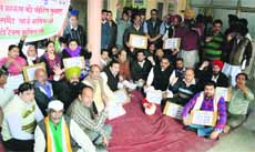 Congress councillors hold a protest against the MC at the Zone A office in Ludhiana on Thursday. 