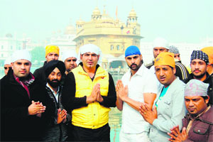 Actors KS Makhan and Harry Josh pay obeisance at the Golden Temple in Amritsar on Friday.