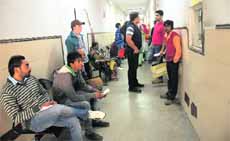 New recruits of the Chandigarh Administration wait for their turn at GMSH, Sector 16, Chandigarh, on Friday. 
