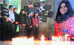 Students pay tribute to Kalpana Chawla on her 10th death anniversary at the PEC Institute of Technology in Chandigarh on Friday. 