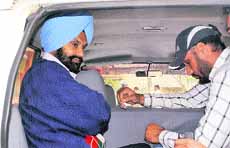 The accused in police custory at Phase I, Mohali, on Friday.