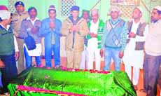 Circle Officer Rajesh Bhatt at the dargah of Hazrat Baba Sharma Lussah Rahamatullah Allay at Maidaniyan, Jwalapur, in Haridwar on Friday.