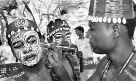 Artists from Gujarat get ready for a performance at the 27th International Surajkund Mela on the eve of its inauguration on Friday.