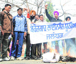 Unemployed linemen protest in Jalandhar on Friday.