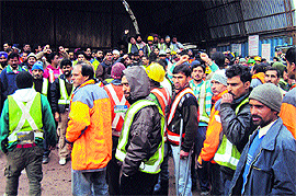 Protesters raise slogans against the LWCL management at Nashri in Batote on Friday