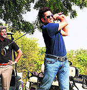 Sachin Tendulkar drives at the Kensville Golf and Country Club in Ahmedabad on Friday